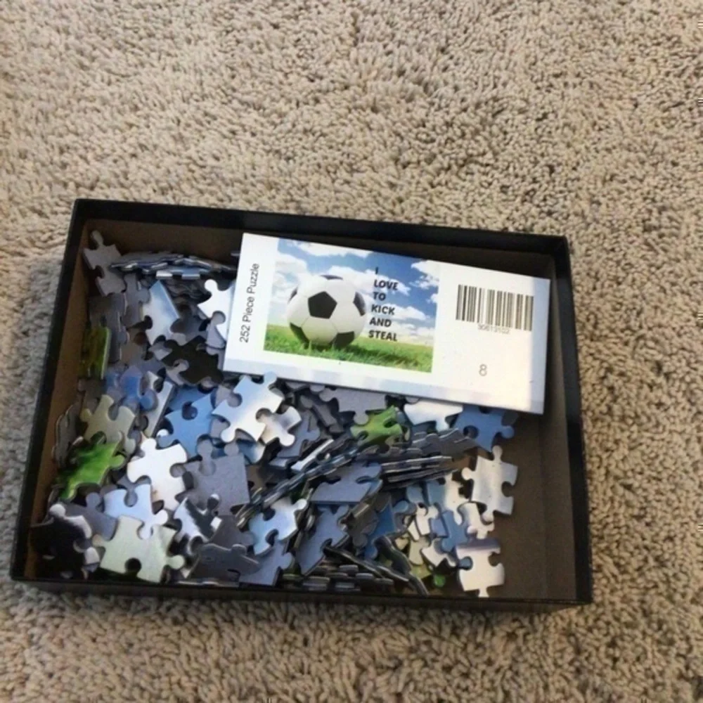 252 piece soccer  puzzle I love to kick and steal